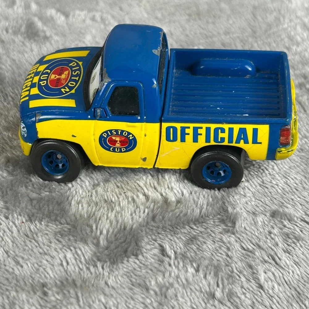 Disney Pixar Cars Piston Cup Official Truck and Sedan Diecast Lot Blue Yellow